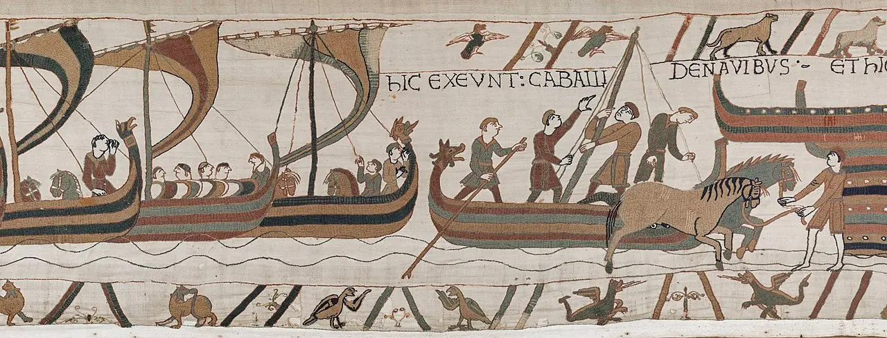 A narrative scene from the Bayeux Tapestry with figures and horses arranged in a horizontal sequence