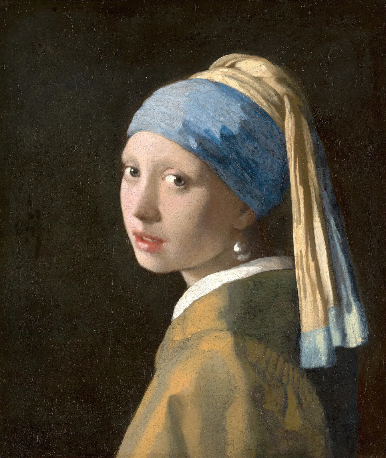 Girl with a Pearl Earring by Johannes Vermeer, shown against a dark background with a bright pearl and turned head